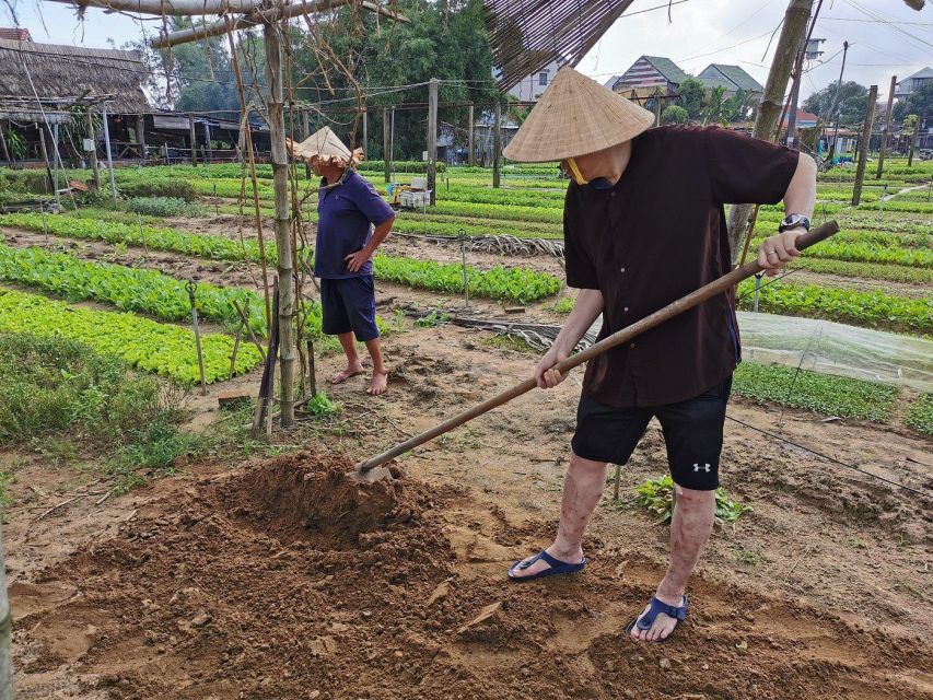 Farming with Farmers at ancient vegetable Village "Tra Que" - Water buffalo ride and basketboat rowing, Tra Que style