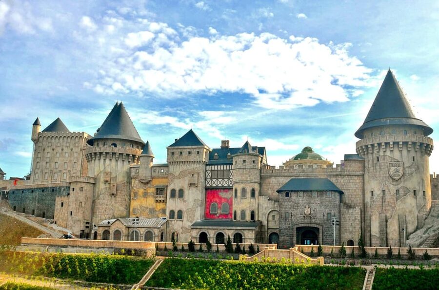 From Da Nang: Ba Na Hills Golden Bridge Private Tour & Lunch - The French Village: stone church, street festival vibes, and a 5-star buffet lunch