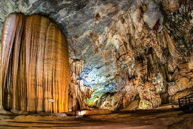 Full Day Discover Paradise Cave From Hue - Inside the cave: narrow entry, big room energy