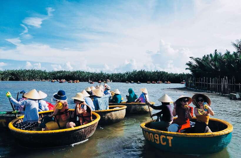 Hoian/ Danang: Coconut Basket Boat and Hoi An City tour - Entering Hoi An’s Old Town with a guide named TinTin